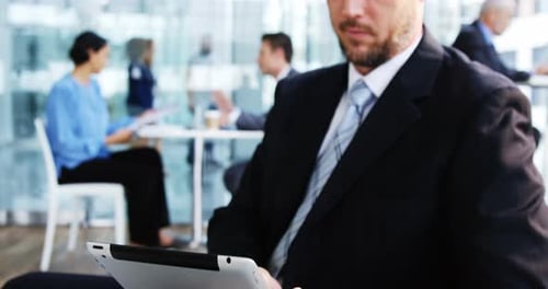 Businessman using digital tablet