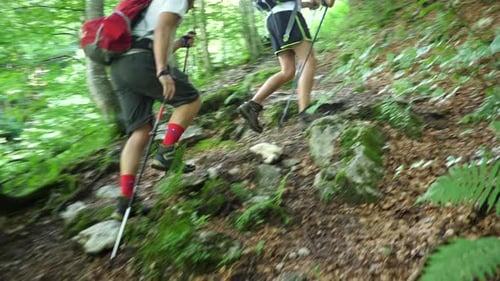 POV view of hikers hiking in the mountains.