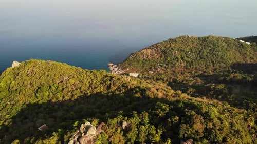 Jungles and Mountains of Tropical Island. Drone View of Green Jungles and Huge Boulders
