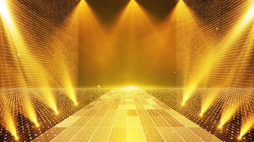 Der Bühnenhintergrund der Preisverleihung mit blinkendem goldenen Partikellicht