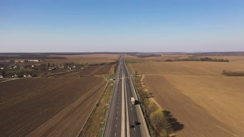 Aerial View of a Beautiful Motorway Along the Fields
