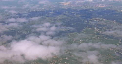 Cloud Top Aerial View on Blue Sky Beautiful Natural Landscape From Airplane Window