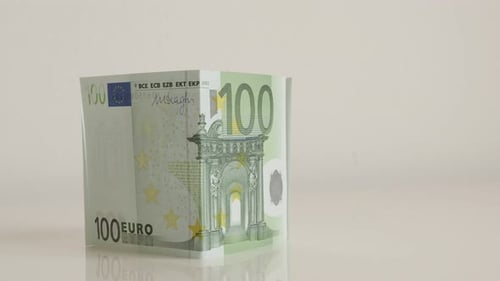 Tilting on house made with hundred euro banknotes 4K 2160p 30fps UltraHD tilting footage - Real esta