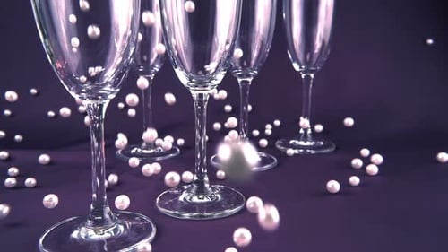 Pearls Falling Around Elegant Champagne Glasses