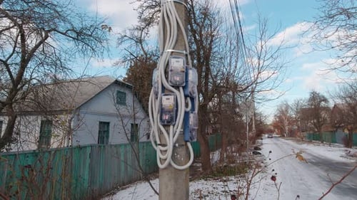 Concrete Pole with Electrical Wires and Meters