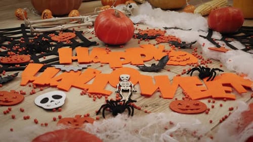 Halloween Still Life with Pumpkins and Spooky Decor