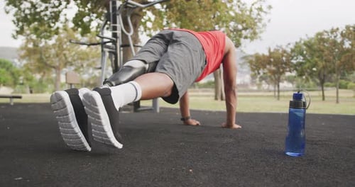 Rear view man with prosthetic leg cladding