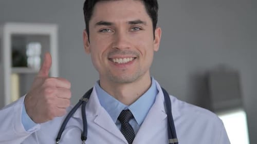 Thumbs Up By Young Doctor