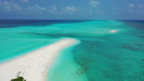 Aerial flying over landscape of luxury sea view beach break by transparent lagoon with white sandy b