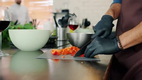 Close-up of Chef's Hands Cutting Vegetables for Salad in Cooking Class Preparing Meal