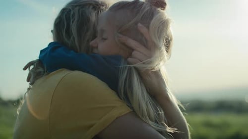 Mom with little daughter bonding and spending time together at the meadow. Shot with RED helium came