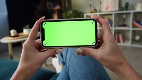Woman Using Smartphone with Green Screen