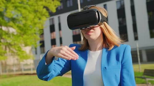 Woman Wearing VR Headset Outdoors