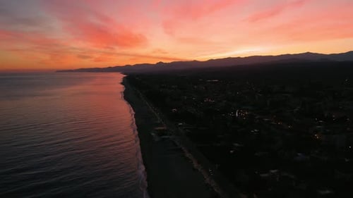 Sunset on the ocean in aerial view