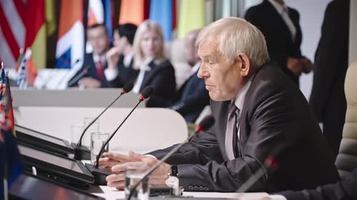 Man Speaks at Political Conference Meeting