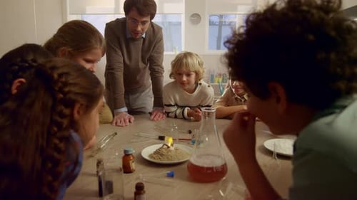 Children Learning Science with Teacher in Classroom