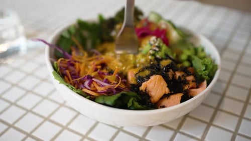 Fresh Poke Bowl Close Up Being Mixed