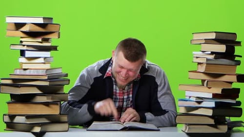 Guy Suddenly Finds His Article in the Book and Is Very Happy. Green Screen