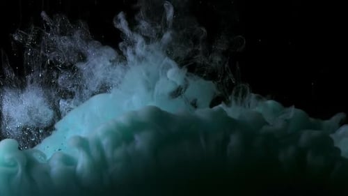 Teal Blue Fluid Paint Is Magically Swirling Into Beautiful Abstract Cloudy Mist