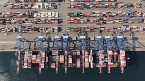 Container ship loading and unloading in deep sea port