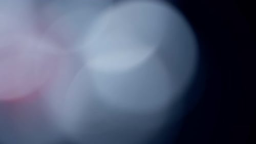 Multicolored Light Leaks Footage on Black Background Stylizing Video Transitions Bokeh Effect