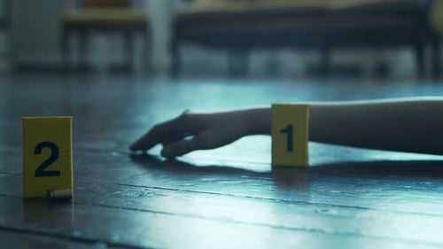 Hand and Evidence Markers on Floor