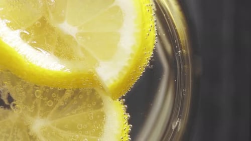 Close Up of Lemon Slices in Sparkling Water