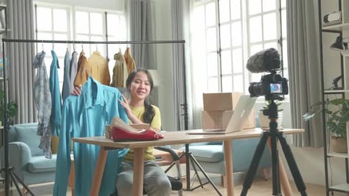 Female Vlogger Sells Clothes Online in her Home