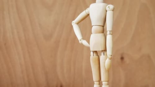 Wooden Mannequin in a Home Setting