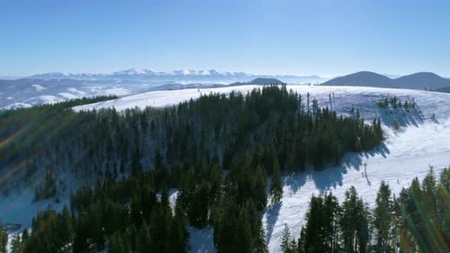 Aerial - Ski Lift at Ski Resort in Sunny Carpatian Mountains