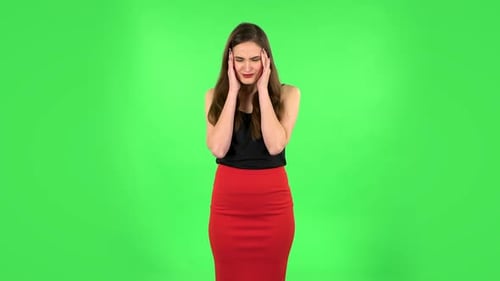 Woman Suffering From Headache From Fatigue. Green Screen