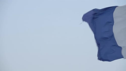 Flag with Blue and White Flowing in Wind