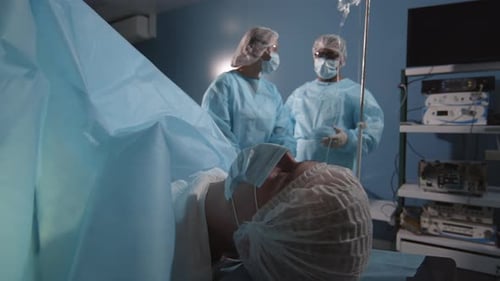 Patient Lying on Surgical Table Prepped for Surgery