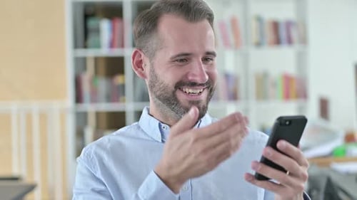 Adult Using Smartphone, Celebrating Good News