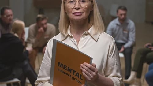 Woman Holding Mental Health Support Group Folder