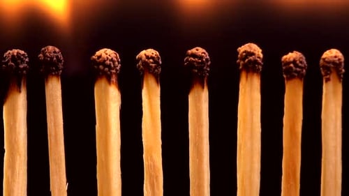 Matches Lighting and Burning in a Line