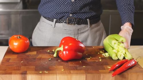 Chopping Vegetables on Wooden Cutting Board