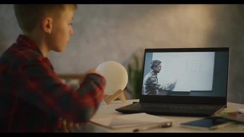 Boy Watches Online Math Lesson, Falls Asleep