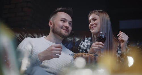 Young Couple Enjoying Evening Together at Home
