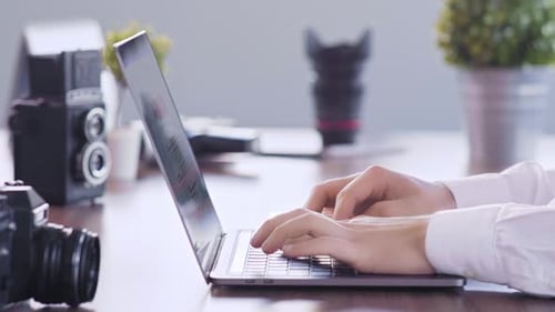 Man Working On Laptop (2K)