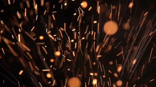 Golden Sparks Ascend Against Black Background