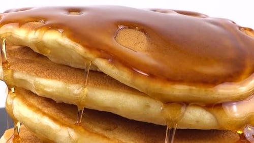 Pancake Stack with Dripping Syrup Close Up