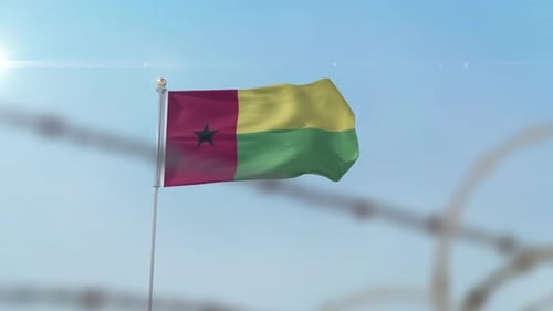 Drapeau de la Guinée Bissau derrière la frontière