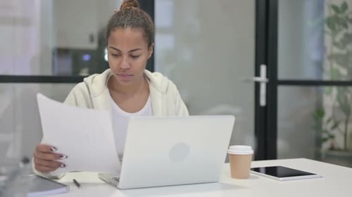 Young Adult Working With Laptop Celebrating Good News