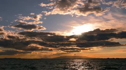 Sunset Lights On Clouds And Sea
