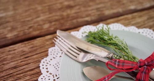 Various cutlery on wooden table 4k