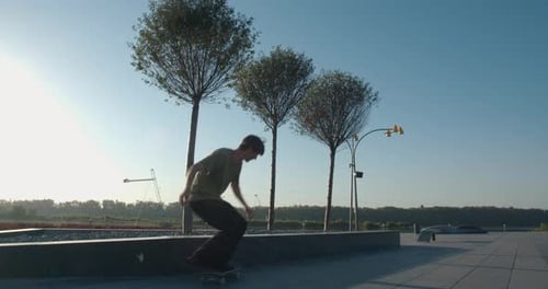 Failing a Rail Slide, Young Man Is Doing a Rail Slide and Falling Down,