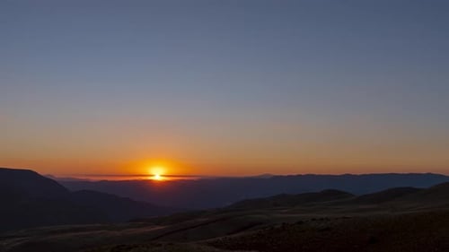 Golden Sunset Over the Mountains Time Lapse
