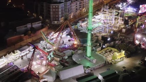 Illuminated amusement path at night time