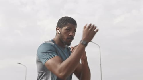 Athletic Man Boxing Training Outdoors